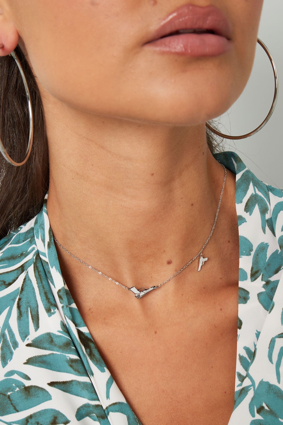 Ketting met 2 pistolen