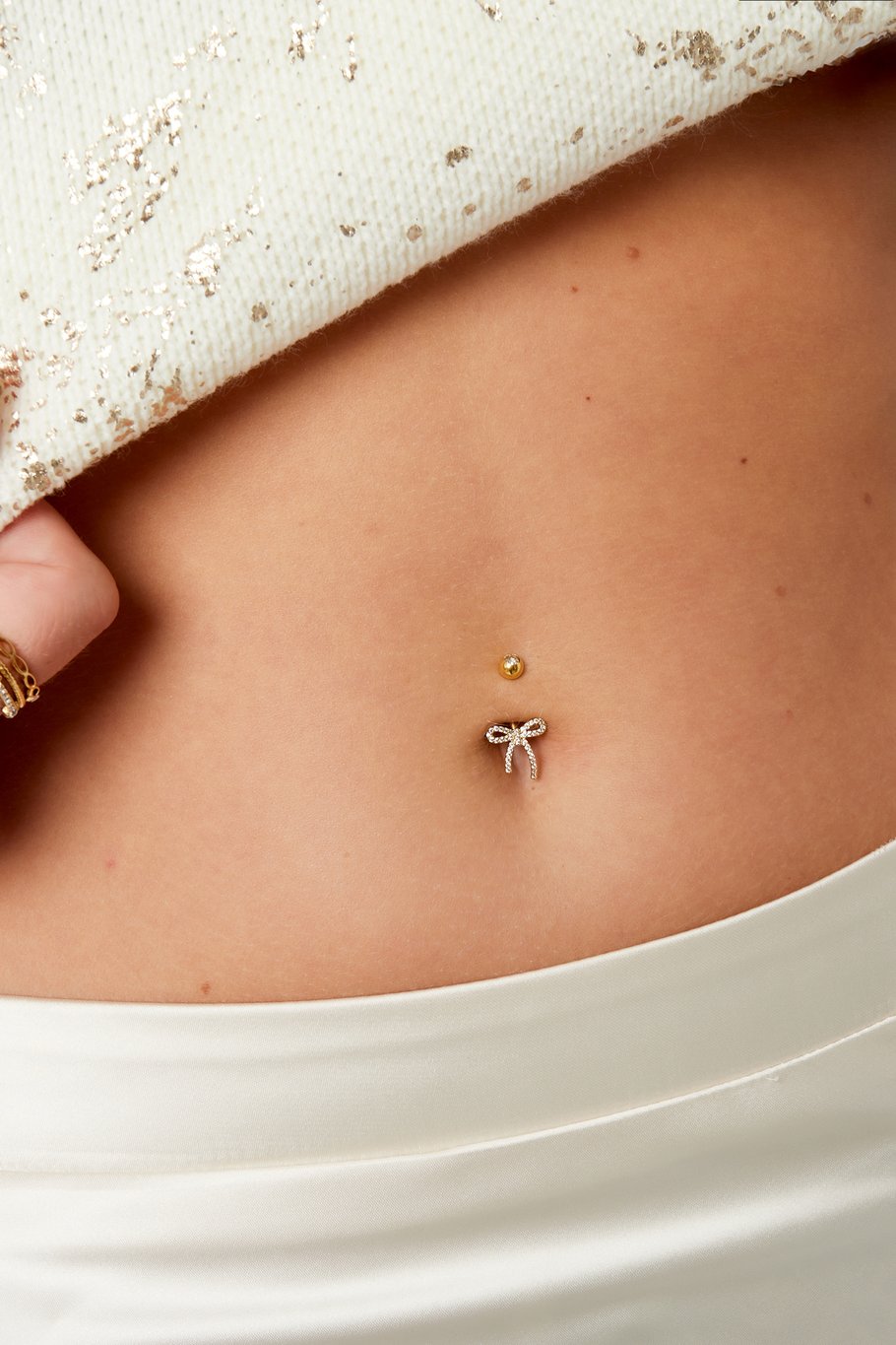 Navelpiercing met strikje