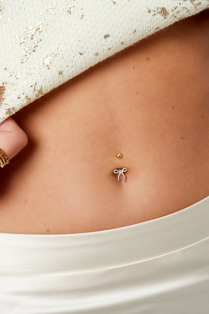 Navelpiercing met strikje
