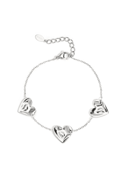 Armbandje met 3 medium hartjes 