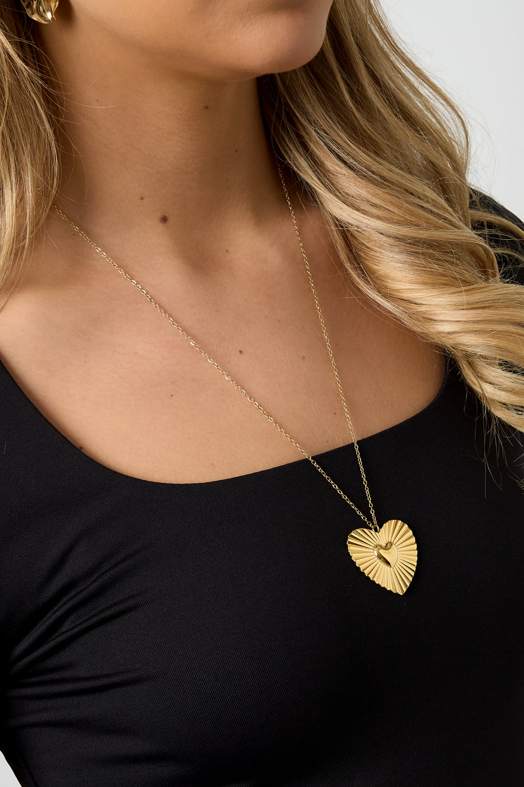 Lange ketting met groot hartje